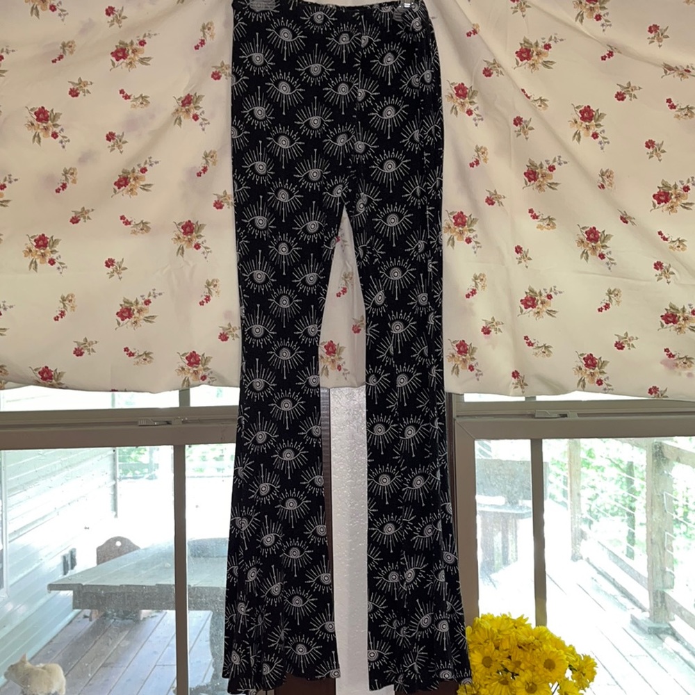 earthbound eye pattern bellbottom leggings